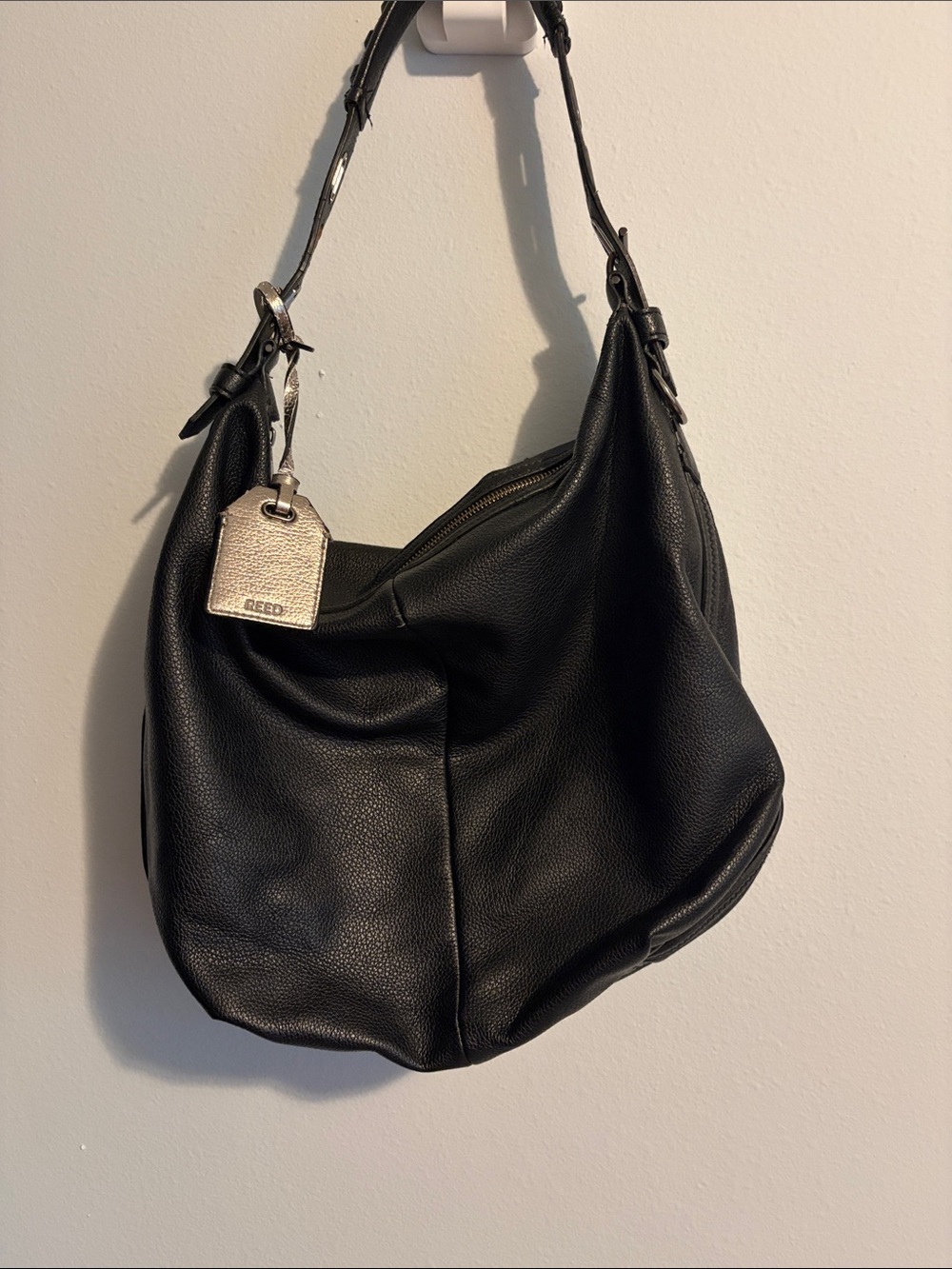 Black Pebbled Leather Hobo Bag with Silver Tag